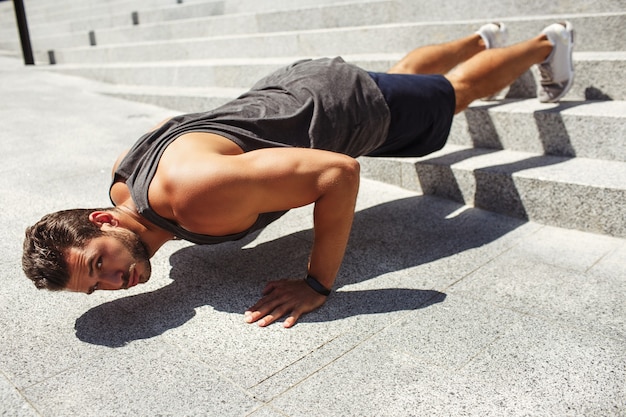 Young man exercising outside