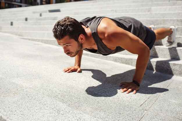 Young man exercising outside