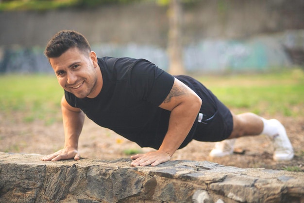 young man exercising in a park