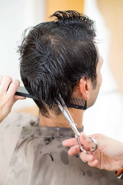 Young man at hairdresser