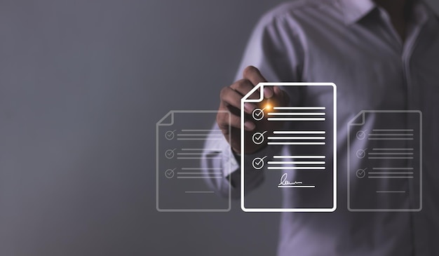 Young man hand using a pen touching to sign a Contract signing Electronic signature Digital documents Future smart contract Online Business Contract