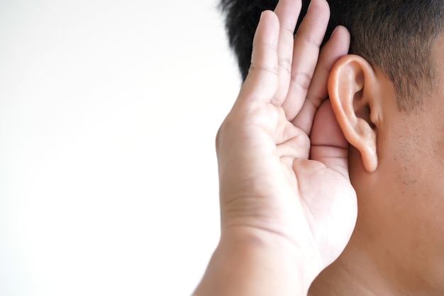 Photo young man hearing loss  sound waves simulation technology