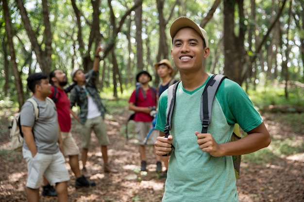 Young man hiker smiling 