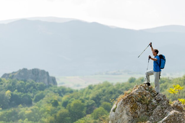 Young man hiking on the mountain