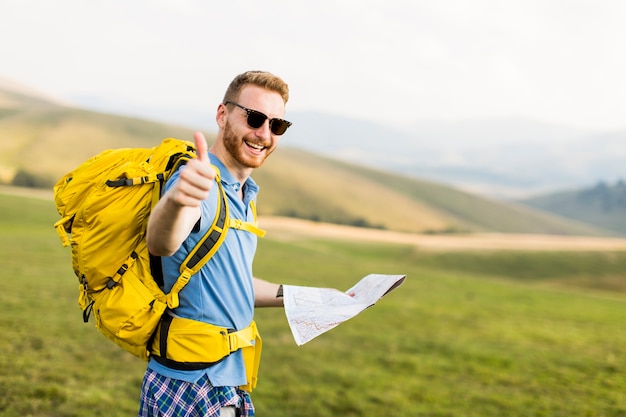 Premium Photo | Young man hiking