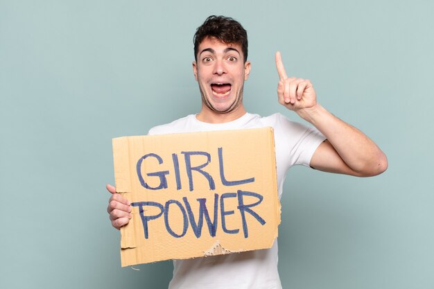 Young man holding a banner