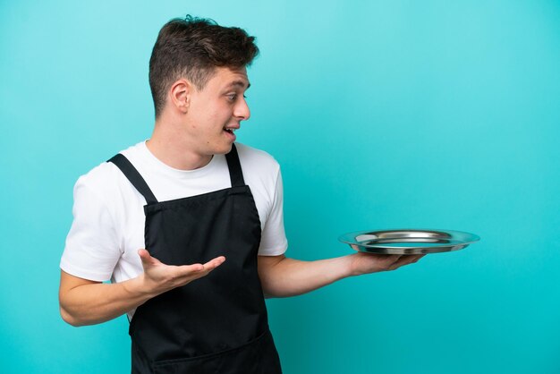 Young man over isolated background