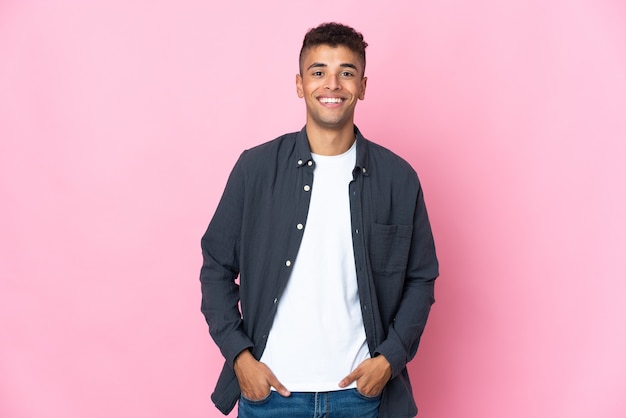 Young man isolated laughing