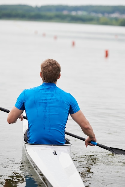 Young man kayaking