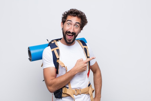 Young man looking excited and surprised