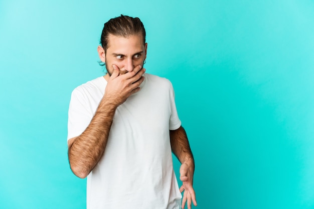 Young man looking shocked