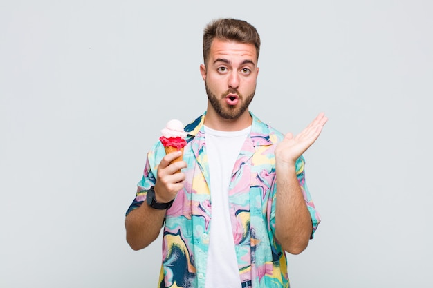 Young man looking surprised and shocked