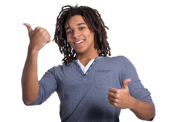 Young man making facial expression against white background