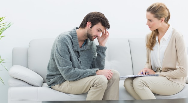 Young man in meeting with a financial adviser