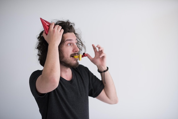 young man on party celebrating new year and dancing