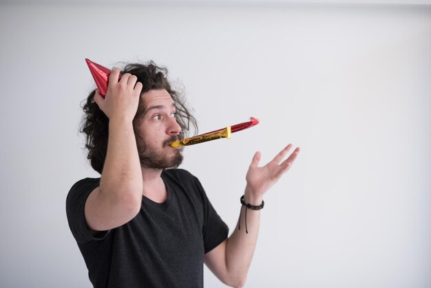 young man on party celebrating new year and dancing