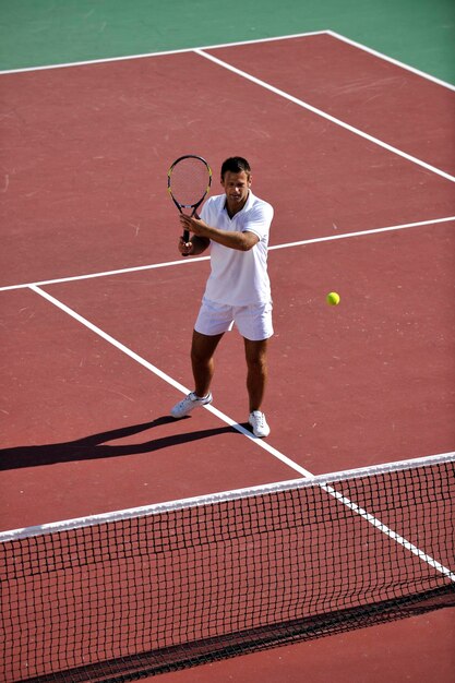 Photo young man play tennis