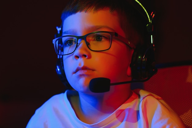 Young man playing computer games on line