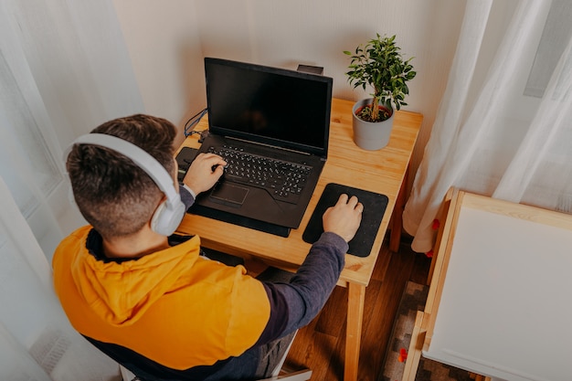 Young man playing computer games