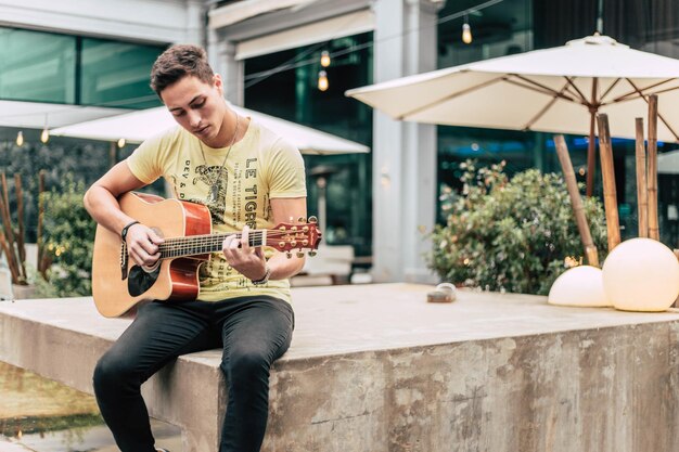 Young man playing guitar