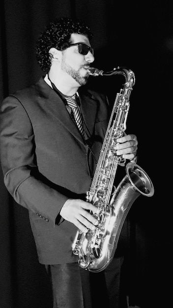 Young man playing sax