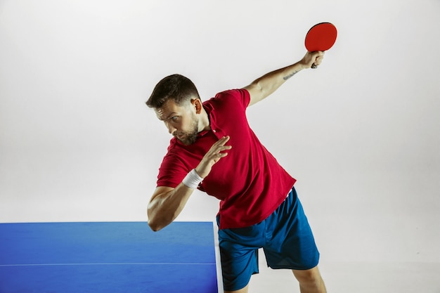 Young man playing table tennis