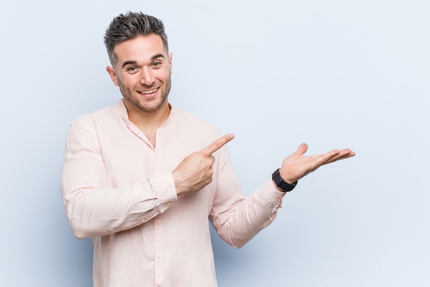 young man pointing to the side
