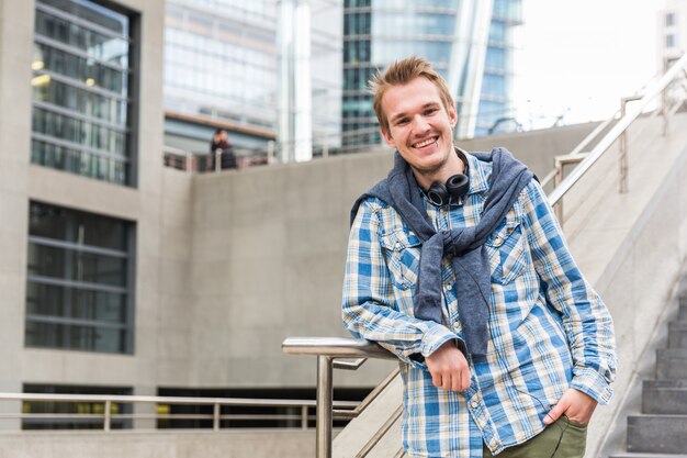 Young man portrait in the city