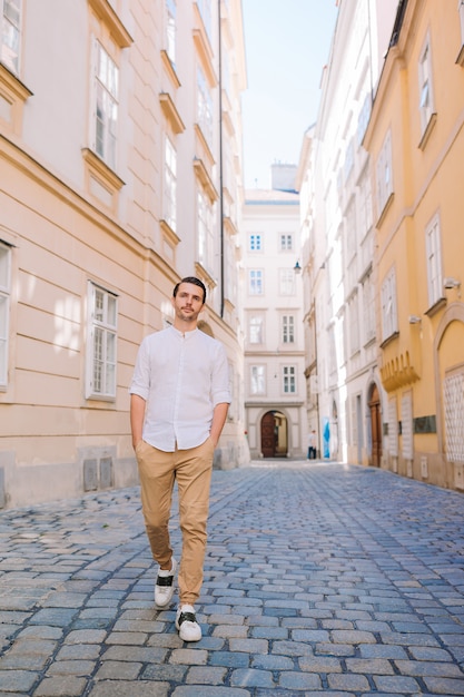 Young man posing at the street