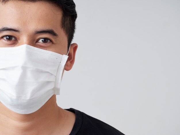 Young man in protective medical mask.