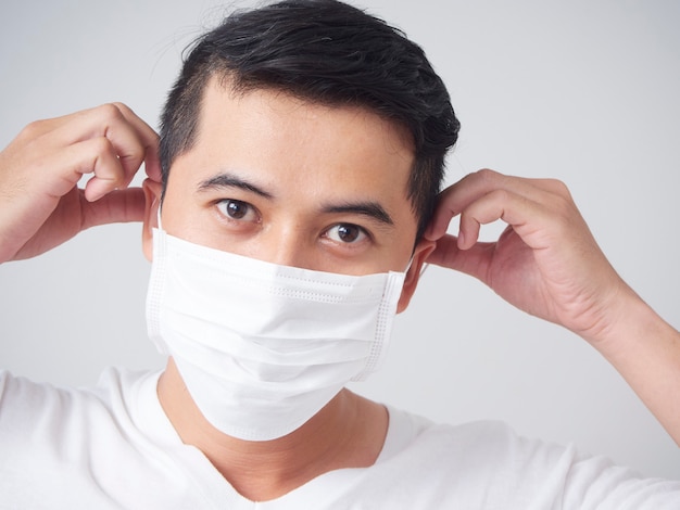 Young man in protective medical mask.