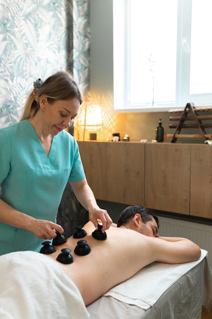 Young man relaxed in spa center