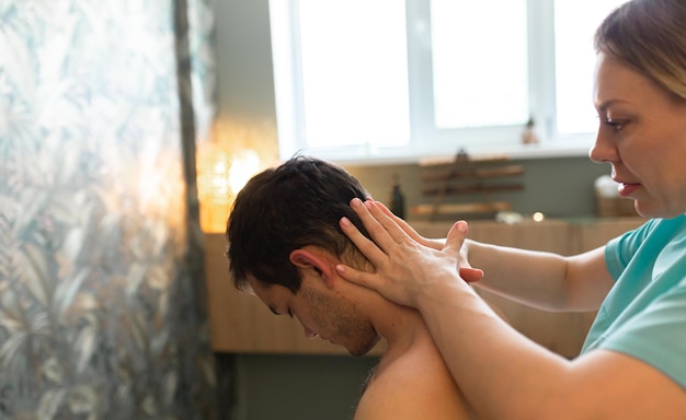 Young man relaxed in spa center