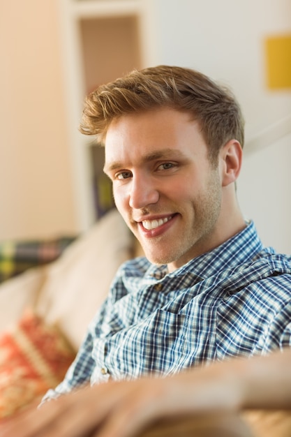 Young man relaxing on his couch