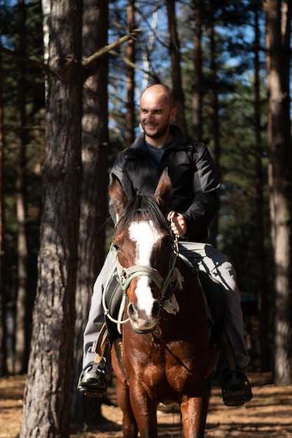 Young Man Riding a Horse