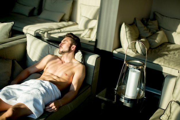 Young man in the room at morning