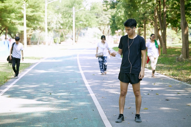 A young man running in the park