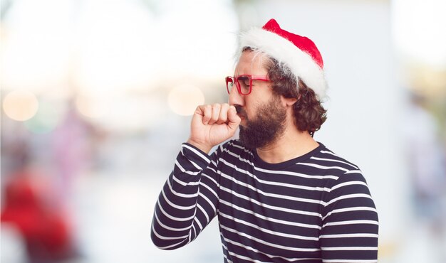 若い男のサンタの帽子。クリスマスの概念