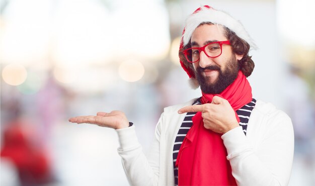 若い男のサンタの帽子。クリスマスの概念