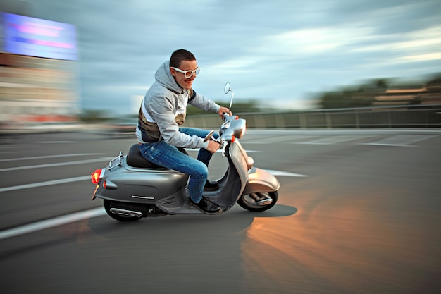 Young man on scooter