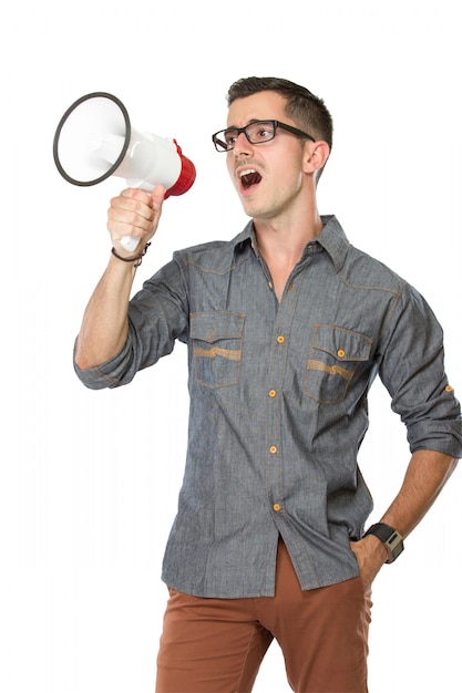 Young man scream with a megaphone