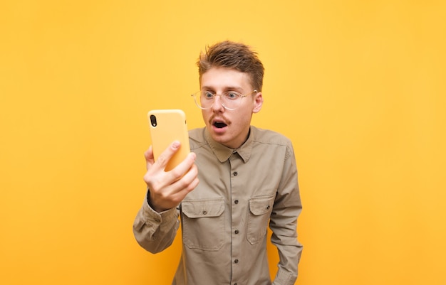 Young man in shirt and glasses isolated