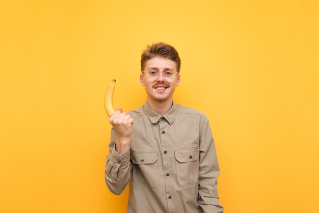 Young man in shirt and glasses isolated