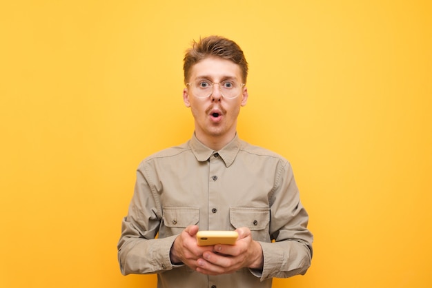 Young man in shirt and glasses isolated