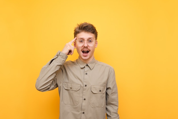 Young man in shirt and glasses isolated