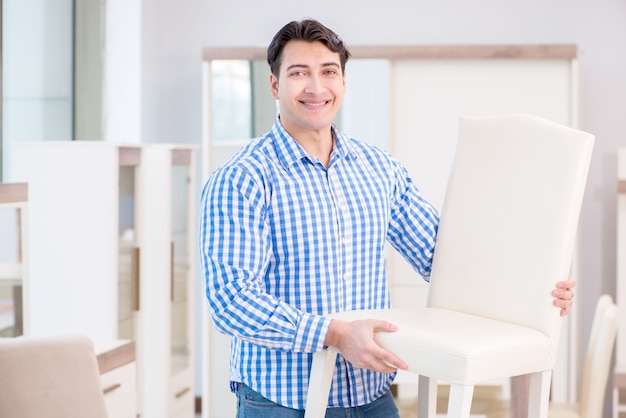 Young man shopping in furniture store