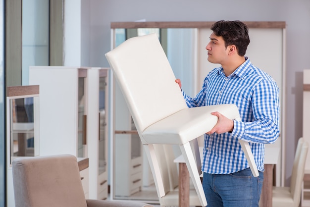 Young man shopping in furniture store