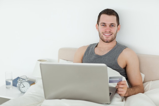 Young man shopping online