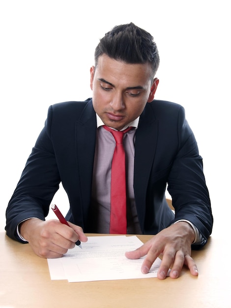 Young man signing contract