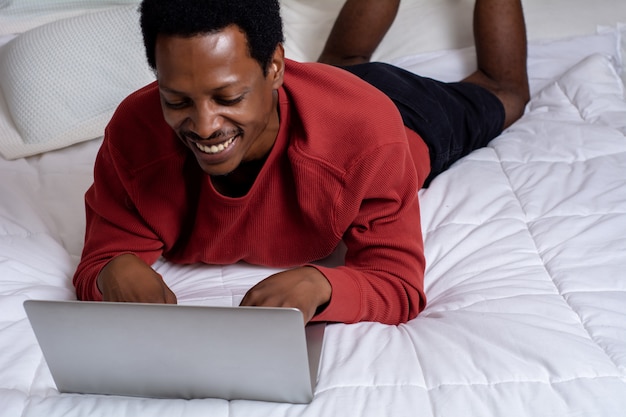 Young man sleeping in bed